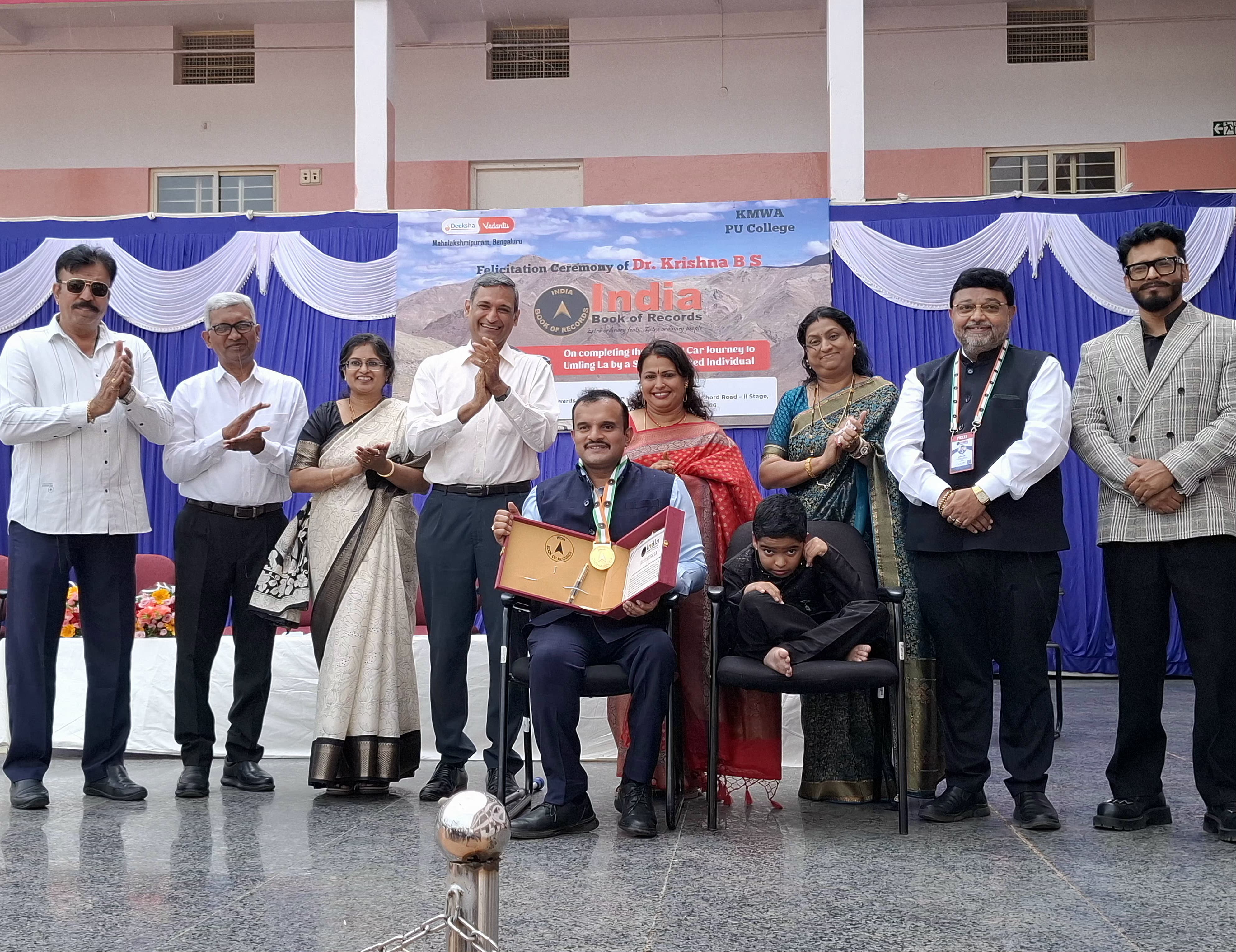 Dr. Krishna B S felicitated by the India Book of Records for a record car drive to Umling La